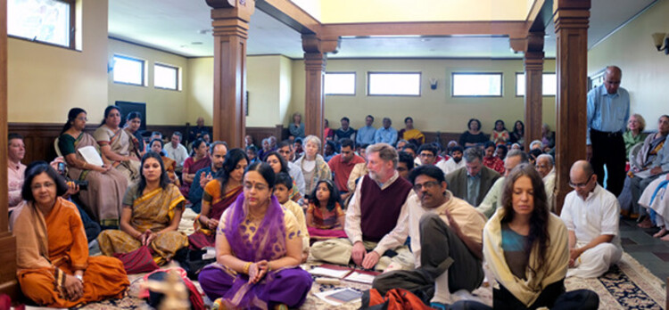 devotees facing the Shrine devotees facing the Shrine
