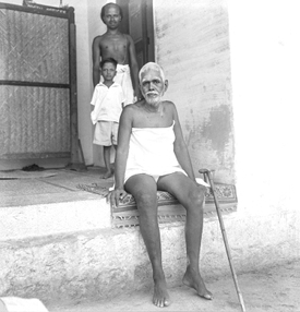 Sri Bhagavan with Sri Sundaram standing in front of Subbaier