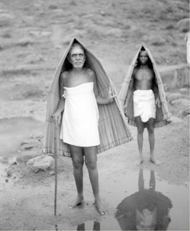 Bhagavan with unbrella, boa.52