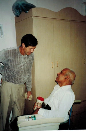 Dennis talking with Bhagavat