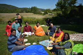 devotees enjoying prasadam