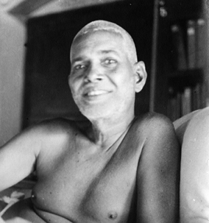 on couch smiling, closeup